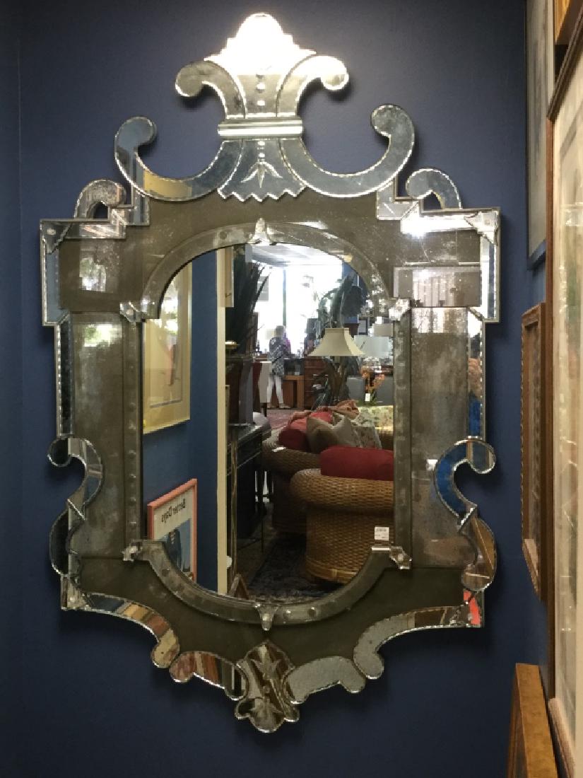 Vintage Venetian Mirror: The origin of this Venetian mirror dates back to the Renaissance, a time when Venice was already taking the lead in glass production. Each piece of glass is hand cut and painstakenly etched by hand. T