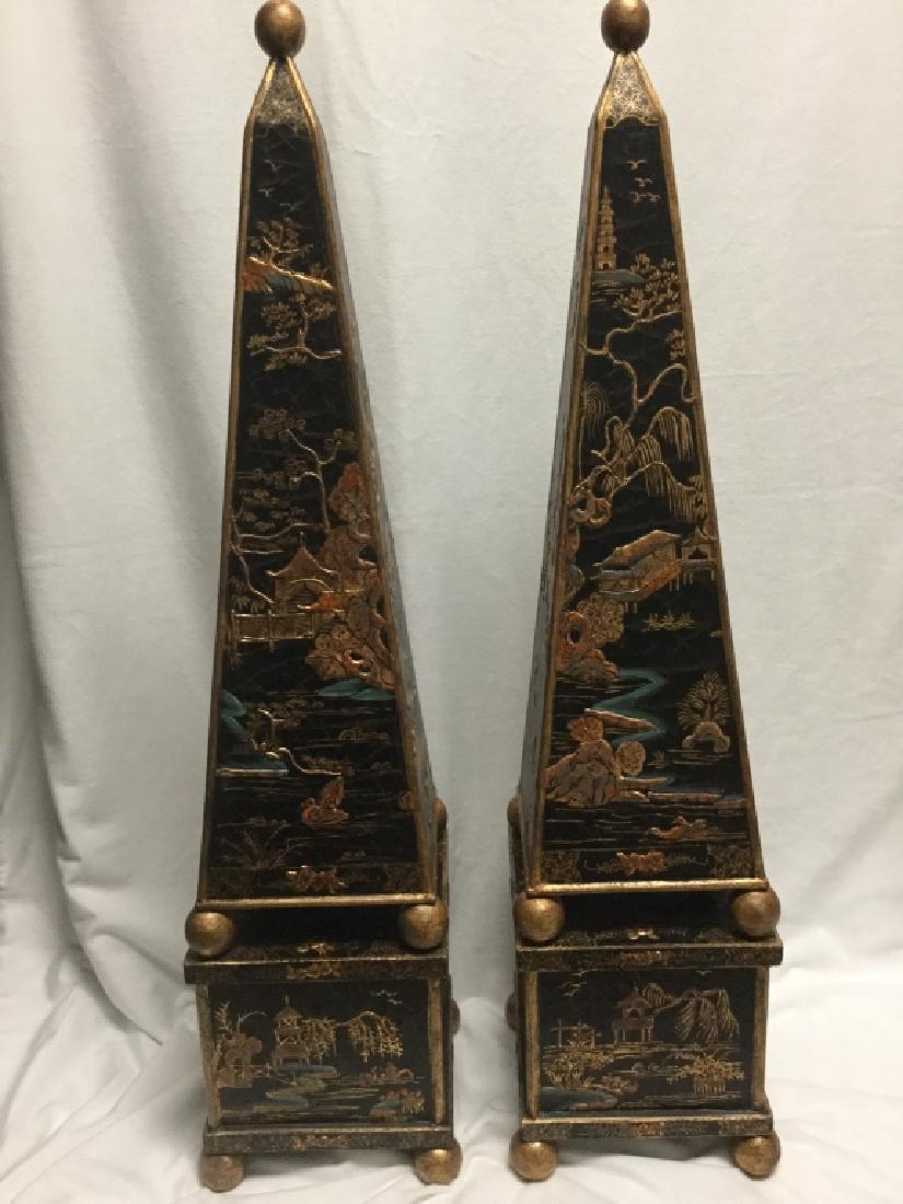 Pair of Wooden Chinoserie Inspired Obelisks: Nice Pair of Chinoserie inspired obelisks in black, gold and a hint of blue35 1/2" tall8 1/2" wide and deep