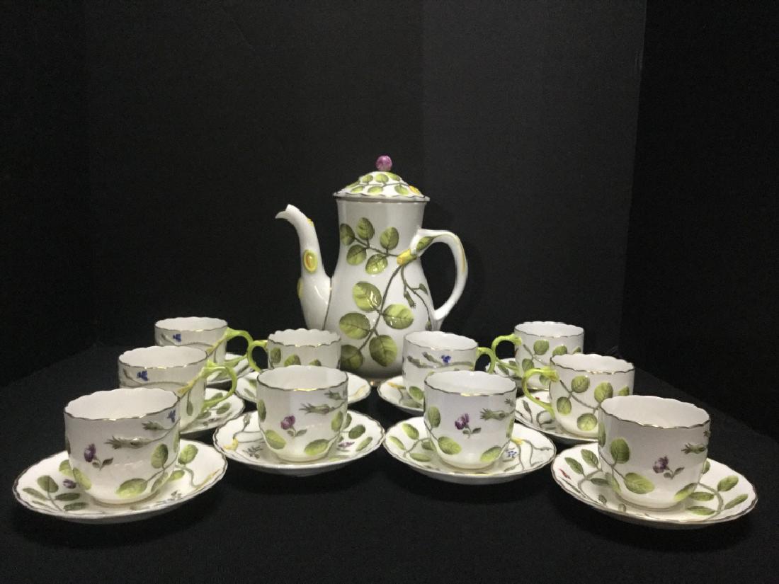 Royal Worchester Blind Earl Tea Set: Set of 10 tea cups + saucers and teapot decorated with pink rose finial and adorned with yellow flowers. This set is Royal Worcester bone china in “The Blind Earl Circa 1770” raised multicolored b