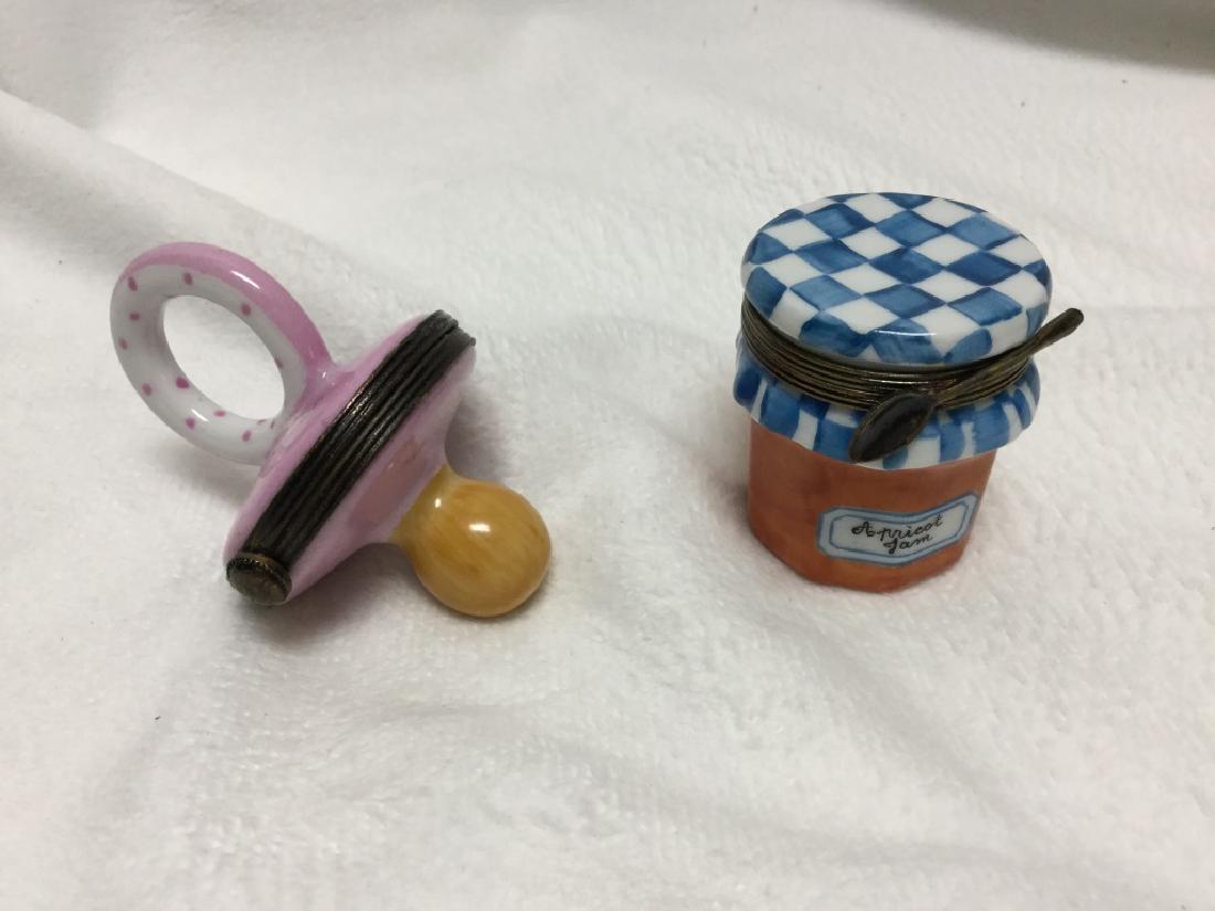 Authentic Limoge Apricot Jar and Pacifyer: This exceptional Limoges box features an elaborately detailed JAR OF APRICOT JAM with an APRICOT on top. Inside is a porcelain APRICOT accessory. This outstanding Limoges box is artfully and colorfull