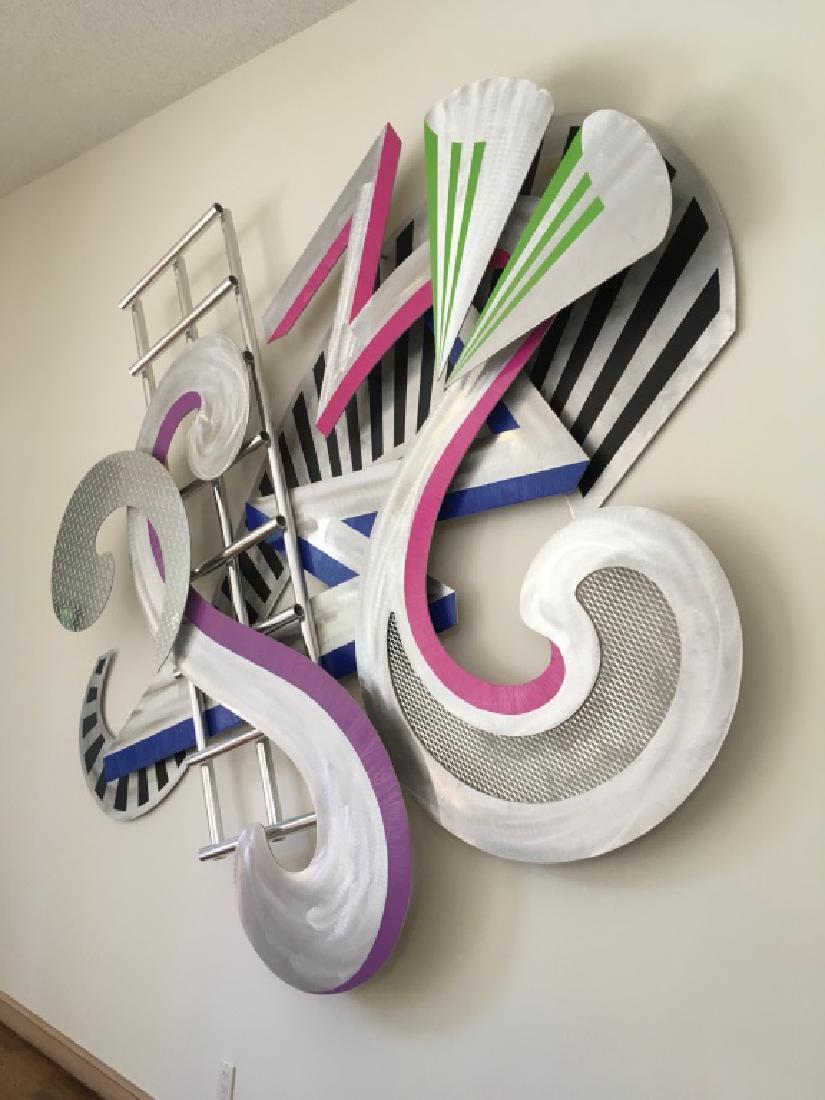 LARGE LUNT MID CENTURY MODERN METAL ART SCULPTURE: Impressive Lunt Mid Century Modern Sculpture. Composed of three different types of metal in hues of silver, purple, pink , and green. Extra large to fit the backside of a couch. Very good condition on