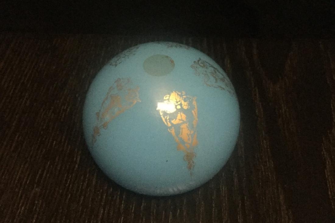 BACCARAT SKY BLUE OPALINE PAPERWEIGHT GOLD PAINTED: Baccarat paperweight in sky blue opaline with handpainted gold detail. Good condition as pictured.