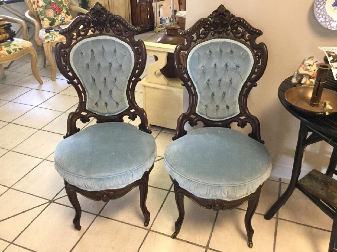 LOT 2 LOUIS XVI CARVED WOOD TUFTED VELVET CHAIRS: Adorable little chairs with tufted silver velvet seating and backs. Ornately carved dark wood trimwork. Measurements: 40" total height x 20" deep x 18" width of seat and 18" seat height. Excellent con