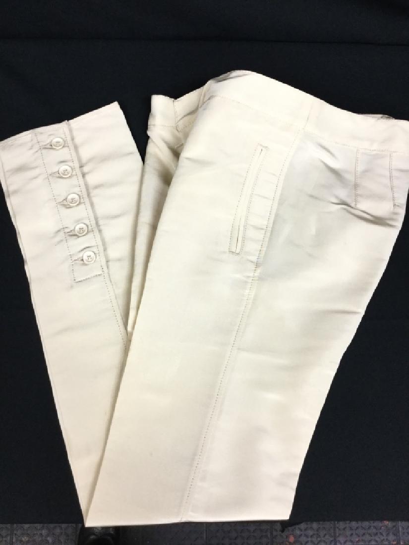 ROBERTO CAVALLI SKINNY CROP KHAKI BUTTON PANTS 40: Stunning and in excellent condition. Smooth fitting cropped pants by Roberto Cavalli. Soft khaki in color with a little spandex for comfortable fit and wear. Size 40 on tag. No issues found, excellent