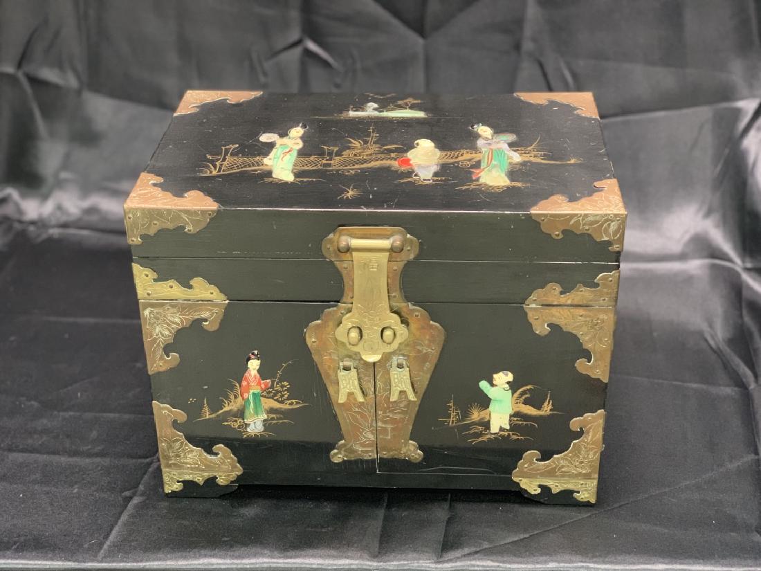MOTHER PEARL INLAY BLACK CHINOISERIE JEWELRY BOX: Asian inspired jewelry box with hinge lid and three red drawers. Dimensions: 14" long x 11" tall x 9" deep. Very Good Condition