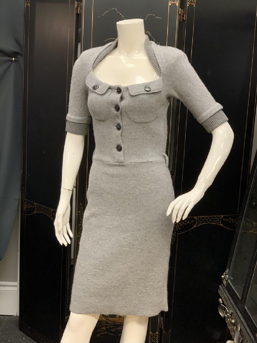 CHRISTIAN DIOR PARIS WOOL ANGORA SHEATH DRESS SZ:4: Stunning piece from the house of Christian Dior! Designed in wool & angora, this baby soft knit dress has a sheath silhouette. Button front closure with buttoned pockets on the bodice. Tapered waist a