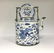 A LATE MING BLUE AND WHITE TEAPOT AND COVER