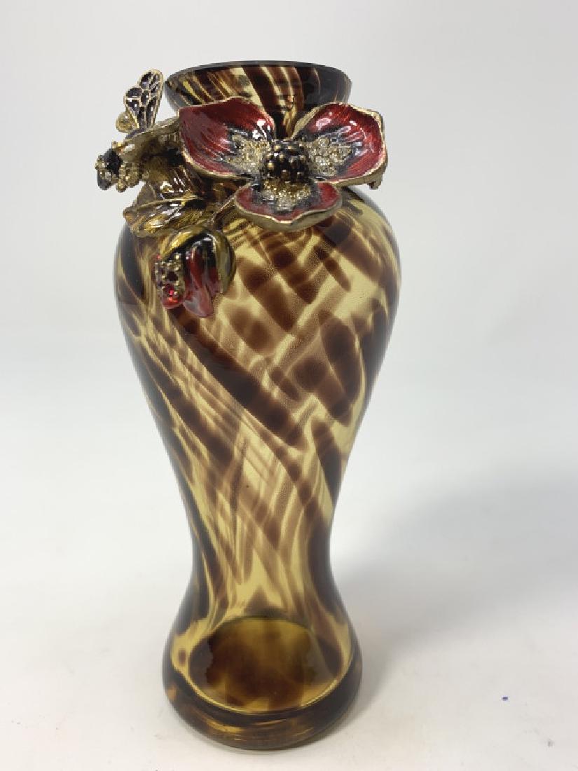 JAY STRONGWATER VASE WITH ENAMEL FLORAL DESIGN: Measures 5 3/4" tall, decorated with a bee flying around a flora petal. Vase in a tortoise design, marked under petal. Pristine condition 3 rd party shipping required