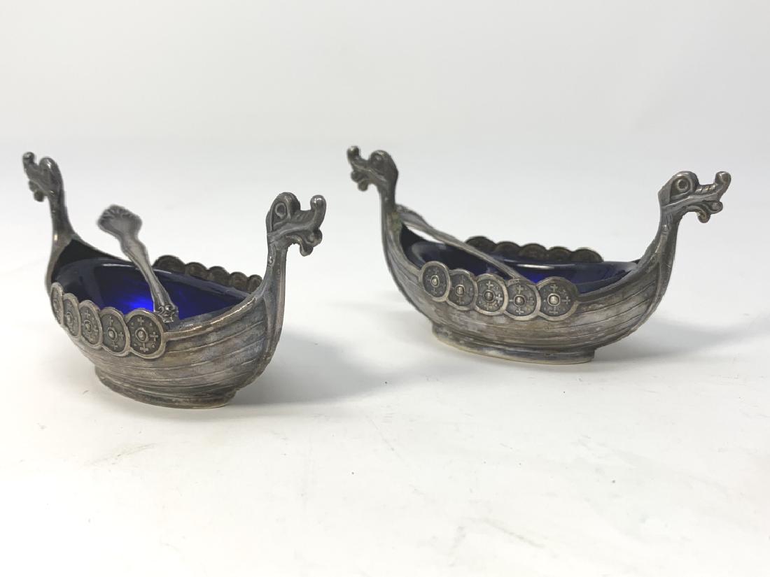 PAIR OF NORWEGIAN 800 SILVER SALT SELLERS & SPOONS: Each measures 3 1/4" in length, with cobalt blue glass liners, along with small salt spoons total weight of the silver itself 41.5 grams third party shipping required
