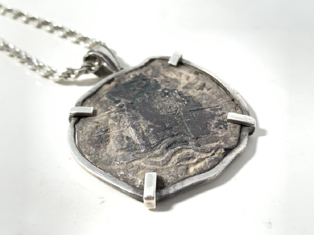 ANTIQUE SPANISH SILVER REAL WITH BEZEL (1 of 2)