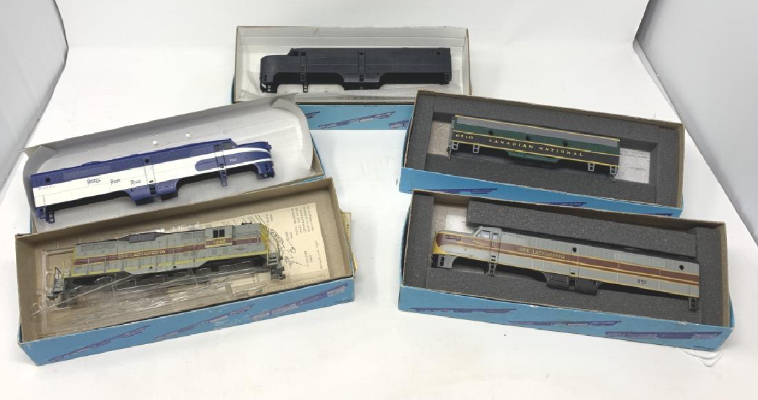 LOT OF 5 HO SCALE TRAINS WITH BOXES: To inc ; Athearn 3310, Nickel Plate road, 1510 Erie Lackawana,Power Diesel3309 Erie & Lackawana no guts Third party shipping required