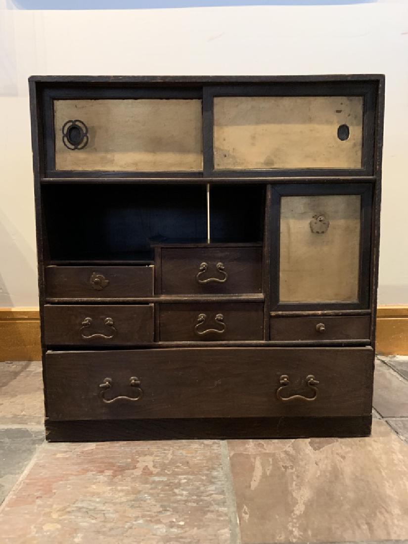 19TH CENTURY CHINESE WOODEN SEWING CABINET: Measures 22 1/2" X 7 1/2"X 24" Wood apears to be stained Pine, with small drawers , in decent condition commensurate with age. 3rd party shipping required