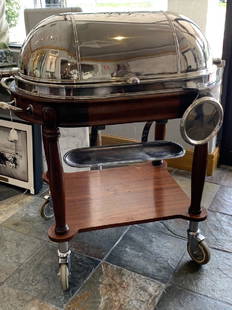 IMPRESSIVE VINTAGE ROAST BEEF TROLLEY CART: Impressive 20th century roast beef cart or carving trolley. It has a dome rotating top opening to reveal a removable warming tray above a hot water reservoir. There is a burner below fitted in a carve