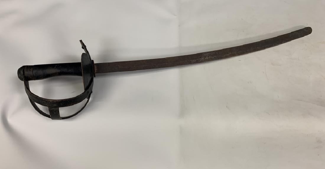 ANTIQUE ROUNDED CEREMONIAL CUTLASS SWORD: Measures 31" from tip of sword to guarded handle, this was primarily a ceremonial sword, in original condition. 3rd party shipping required