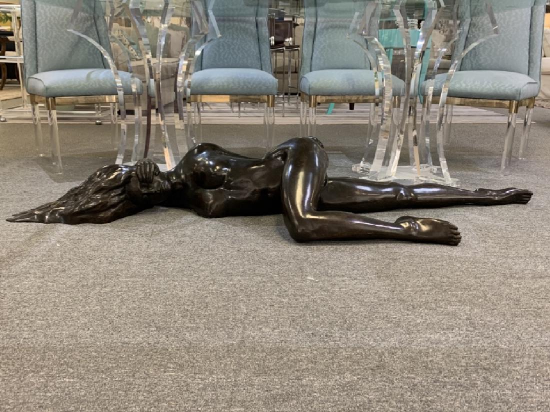 ELLIOT MILLER AMERICAN 20TH CEN LARGE NUDE: Prolific American Bronze sculpture. This is a large life size study of a Nude woman stretched out and laying down. Titled " Magda" This full life size nude adorned the base of a Palm Beach Mansion fir
