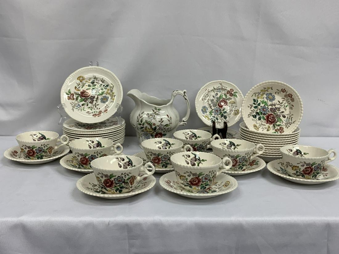 SPODE ROMNEY "COPELAND" FLORAL CHINA 47 PC LOT: SPODE ROMNEY "COPELAND" CHINA SET SET INCLUDES: (6)5.5" B&B plates, (19) 6" Saucers, (13) 6.5" Dessert plates, (8) Flat cups and a 40oz pitcher made by BOOTH's from the "FlowerPiece"Collection. Romney