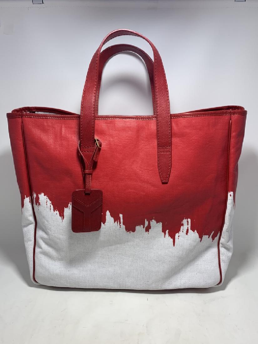 YVES SAINT LAURENT LARGE TOTE SHOPPING BAG PURSE: YVES SAINT LAURENT LARGE TOTE BAG Very large tote perfect for shopping and all your stuff. All leather and very roomy with a zippered pocket inside along with a smaller slide in pocket.15"W X 14"HVery