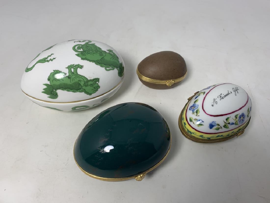 3 LIMOGES HAND PAINTED EGG PILL BOXES 1 WEDGWOOD: Largest about 4". All hand painted . All in excellent condition . Third party shipping required