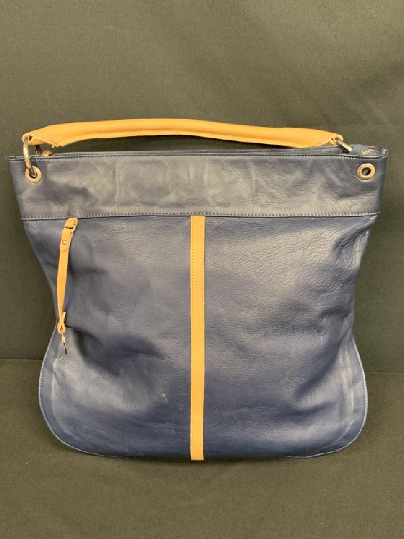 PULICATI FINE ITALIAN LEATHER TOTE DENIM BLUE &TAN: One of the finest makers of bags in Italy. This tote measures 16 1/2" long X 15 1/2" wide, comes with tan leather handle and is in fabuolus condition. Worn one time . Retail close to $400. Third party