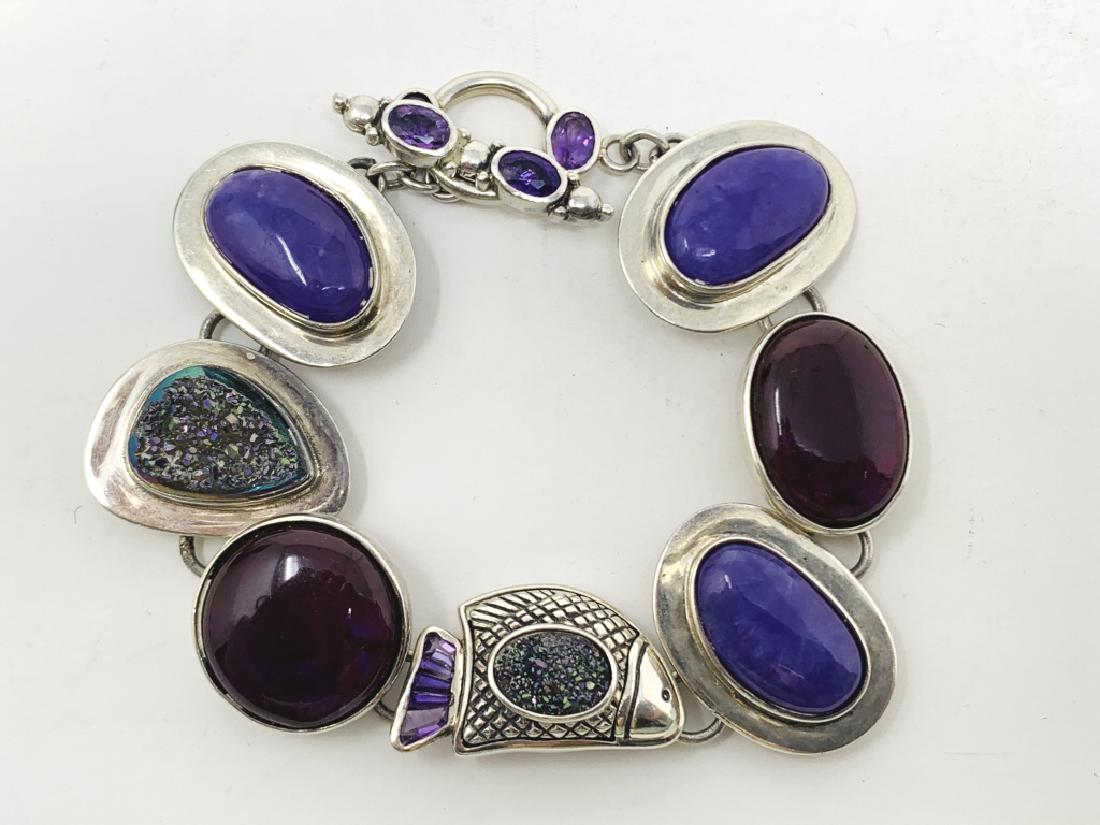 STERLING & SEMI PRECIOUS STONE LADIES BRACELET: Measures 7" long, with amethyst, and carnelian stones. Total weight is 35.6 grams. Third party shipping required