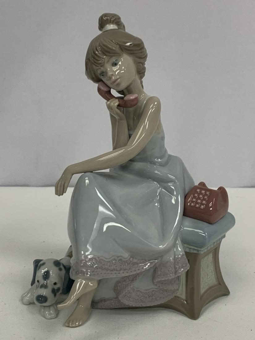 LLADRO FIGURE GIRL TELEPHONE "CHIT CHAT" #5466: LLADRO FIGURE GIRL TELEPHONE "CHIT CHAT" #5466Lladro figurine of a teenage girl chatting on the telephone, Spotty Dalmation dog lieing at her side. Model number 5466. Made in Spain, introduced 1988.7.