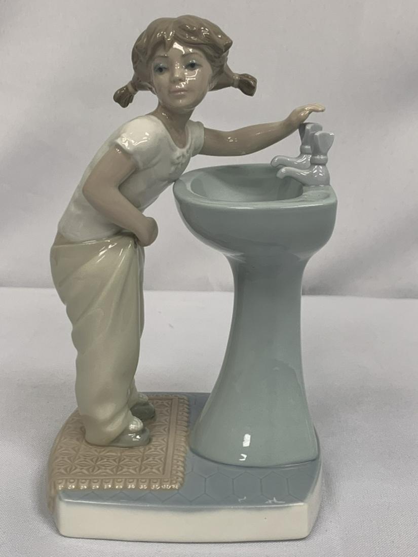 LLADRO 4838 "CLEAN UP TIME" PORCELAIN STATUE: LLADRO 4838 "GIRL AT SINK" PORCELAIN STATUELladro Girl At Wash Sink Figurine"CLEAN UP TIME"~NO Original Lladro Box~ Matte Finish Reference # 4838 Issued In 1973 Retired In 1993 Stands Approx. 7 3/8" T
