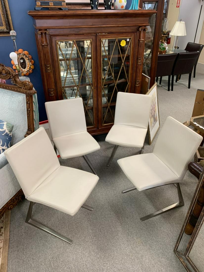 MID MOD BO CONCEPTS GRAY CHROME FLOATING CHAIRS 4#: Soft gray faux leather with chrome floating bases, angled with sleek modern look. Excellent condition, priced for the set of all four chairs. Measurements: 17" x 23" x 33" with a 18" seat height.