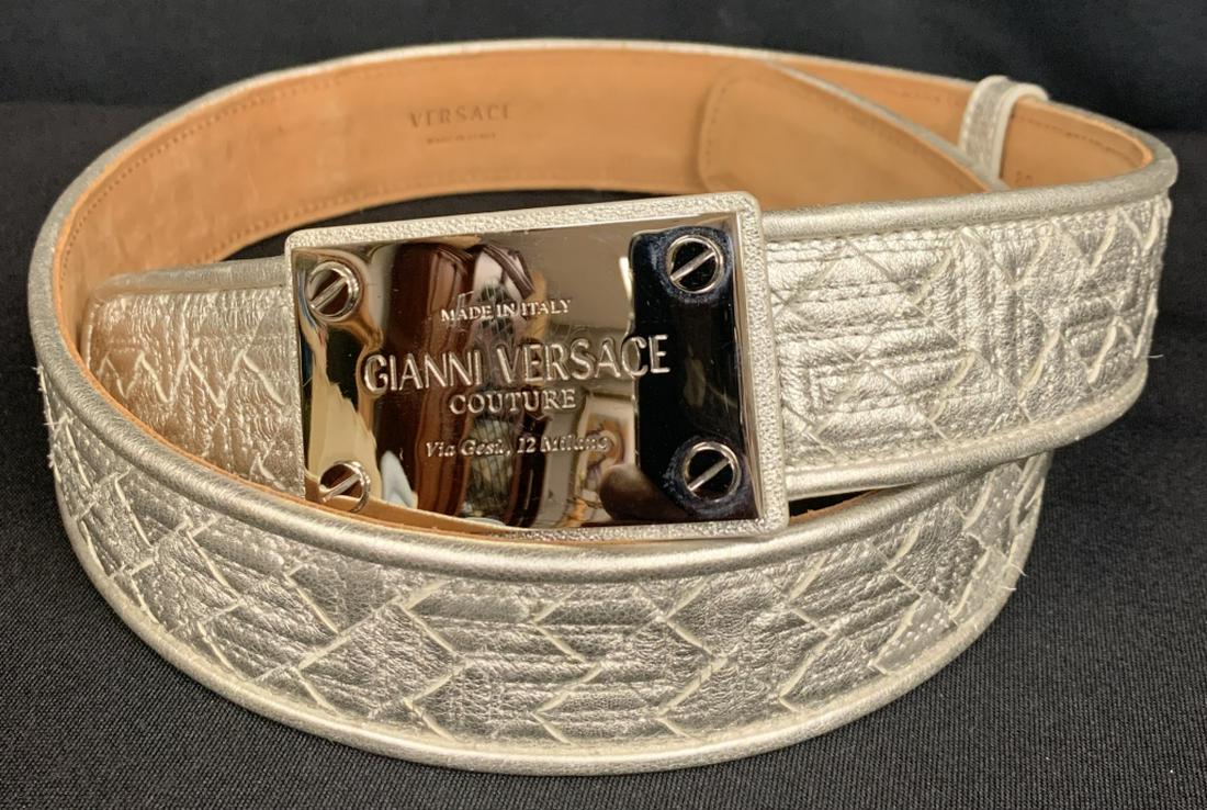 GIANNI VERSACE COUTURE SILVER BELT 40": Gianni Versace Silver belt. 40" length. Italian made with Greek Patent Leather. Engraved belt bucle reads" GIANNI VERSACE COUTURE Via Gesu, 12 Milano". Retails at $775