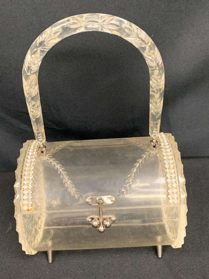 VINTAGE 50'S CLEAR LUCITE RHINESTONE BARREL BOX: Rare lucite rhinestone barrel bag box purse, carved lucite with rhinestones inset and a 3 ball hinged closure on top. Beautifully carved lucite curved handle. Silver hardware. Great vintage condition.