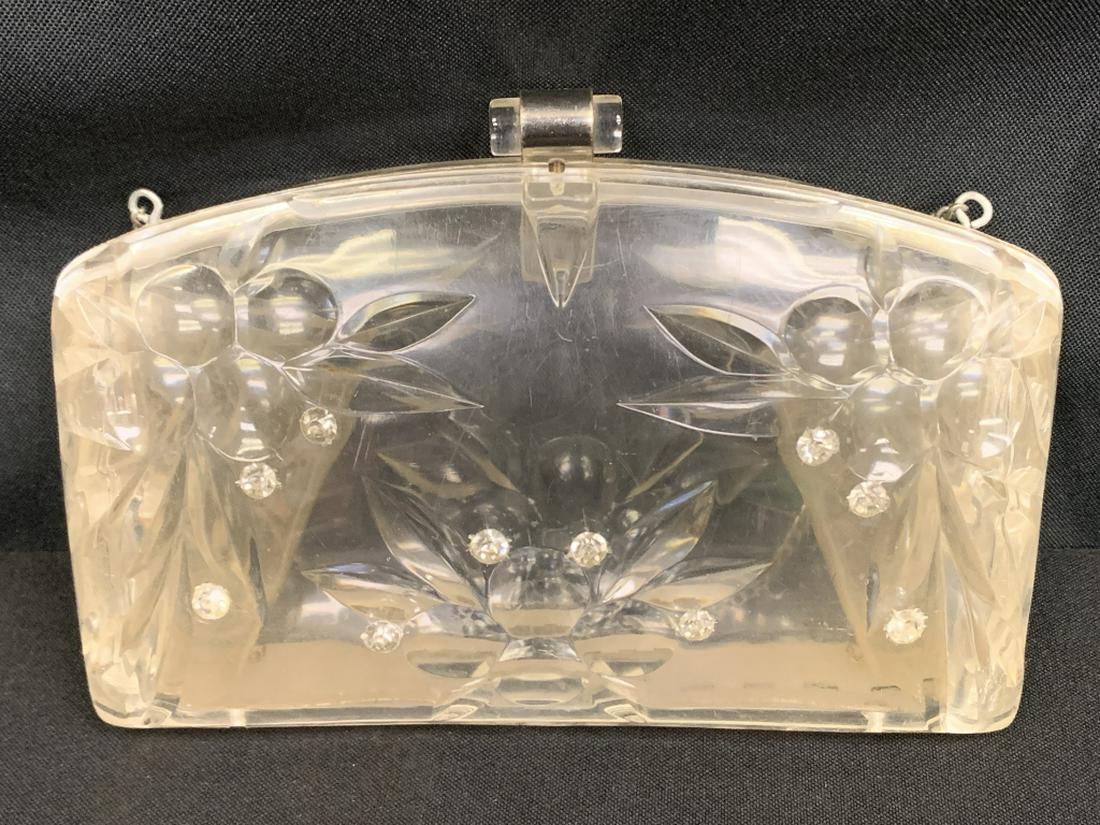 VINTAGE 50'S CARVED LUCITE ENVELOPE EVE PURSE BAG: 7.25" x 5" IN SIZE. Vintage 50's in era. Carved decorative lucite featuring rhinestones decor with envelope style closing, chain strap on purse to carry. Lovely bag and in great condition! Third party