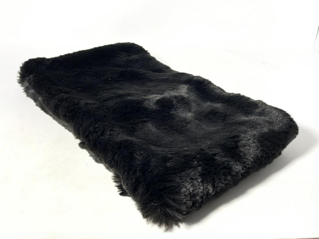 LOVELY BLACK MINK LADIES MUFF BY BADGLEY MISCHKA: 9" Wide and 32" long. This muff was sold by Badgley Mischka, and is in like new condition. Third party shipping required.