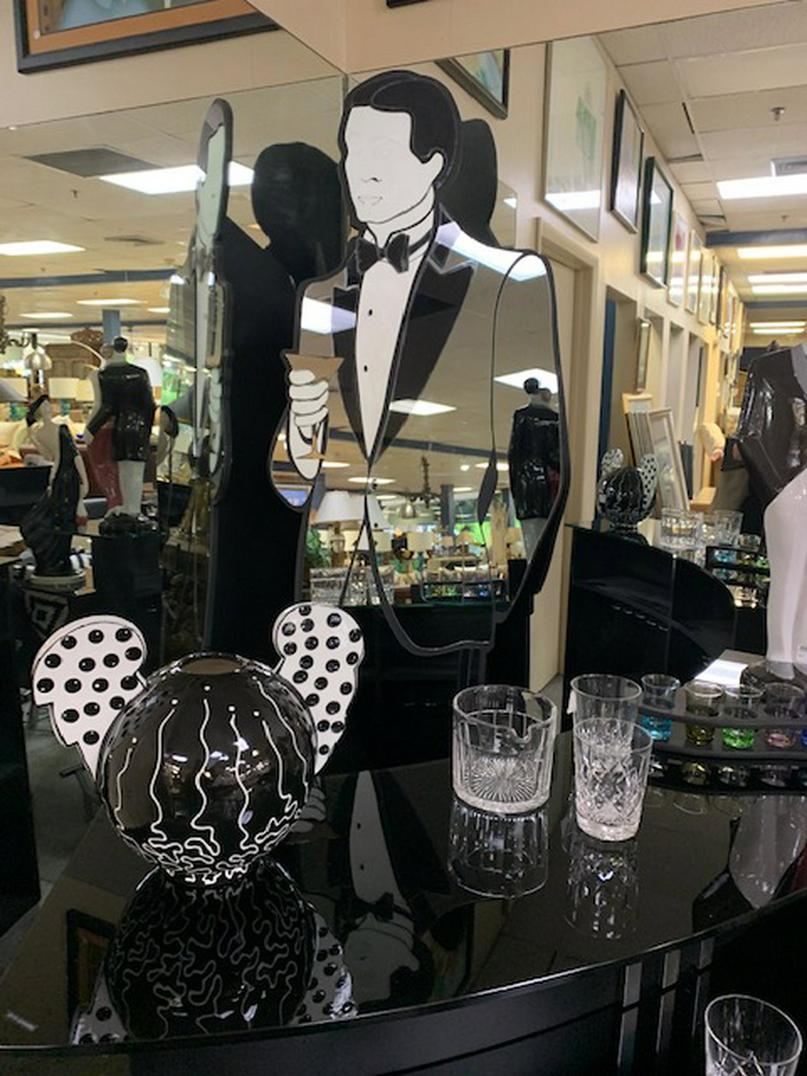 DAVID MARSHALL SIGNED MIRROR ART LIFE SIZE BUTLER: Life sized butler man constructed of mirrored pieces sculpted together. A fabulous decor for your dining area or bar. Stands 68" tall. Excellent condition. Signed by artist. Third party shipping requi