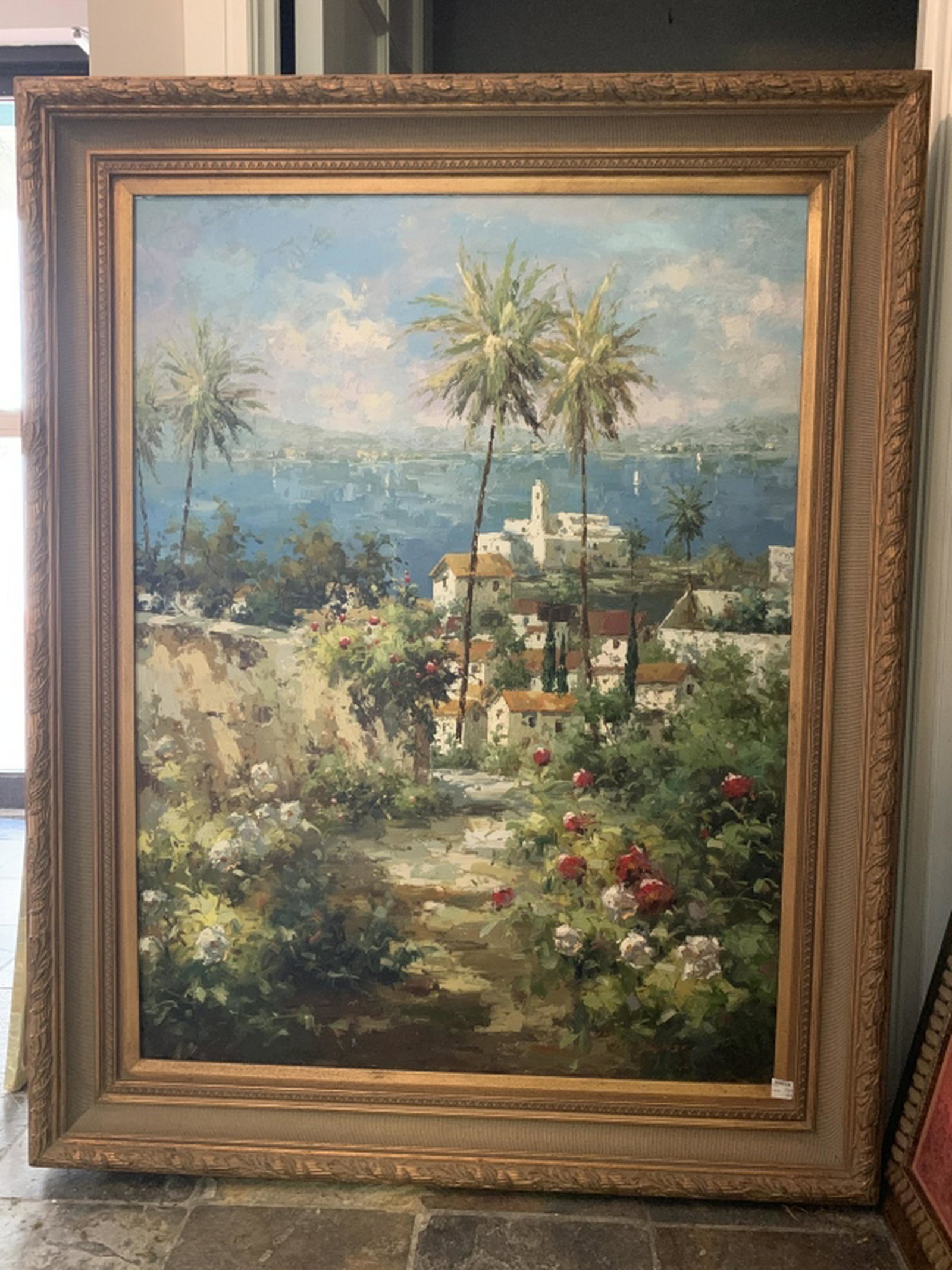 JOHN CROPSY SIGNED SPANISH SEASIDE VILLA FRAMED: This is an oil on canvas painting by the artist John Cropsey and depicts a pathway to the waterfront down a floral lined passage. Measurements are: 46" x 59"