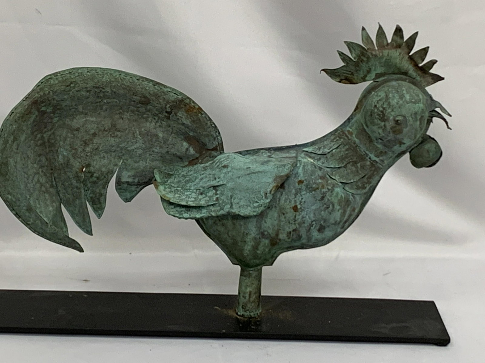 ANTIQUE PRIMATIVE MADE PATINA ROOSTER WEATHER VANE: This is a primitive made,early "turn of the century"patina rooster weather vane. Light weight medal is made in a 3D fashion. It stands 13" high and 4.5" wide. The base is 24" long.