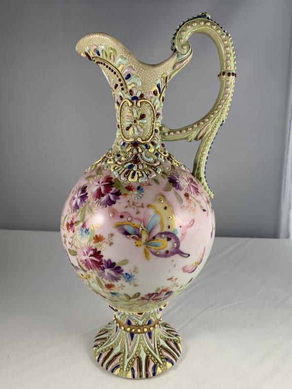 EQUISITE SIGNED NIPPON MORIAGE PITCHER: One of the most beautiful Nipponm Morriage pieces we have ever seen! Butterflies and flowers adorn this stunning piece. The bottom is signed. 9 3/4 x 4 1/2