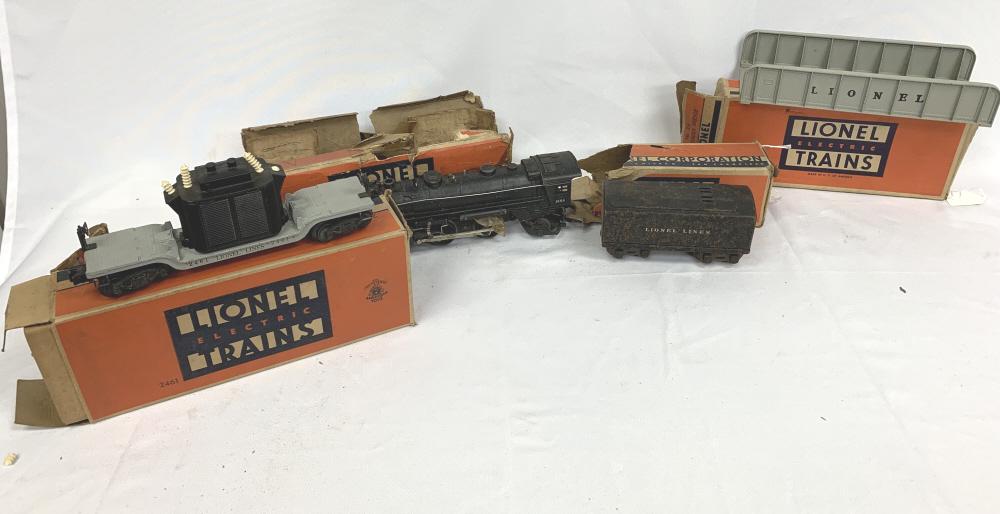 4 VINTAGE LIONEL TRAINS TRAIN ITEMS MIXED LOT: To incude : 1684 Locomotive, 1689 tender, 2461 transformer car, and 314 plate girder bridge. All trains come with their original boxes from the original owner. Some boxes are rough 3rd party shipping 