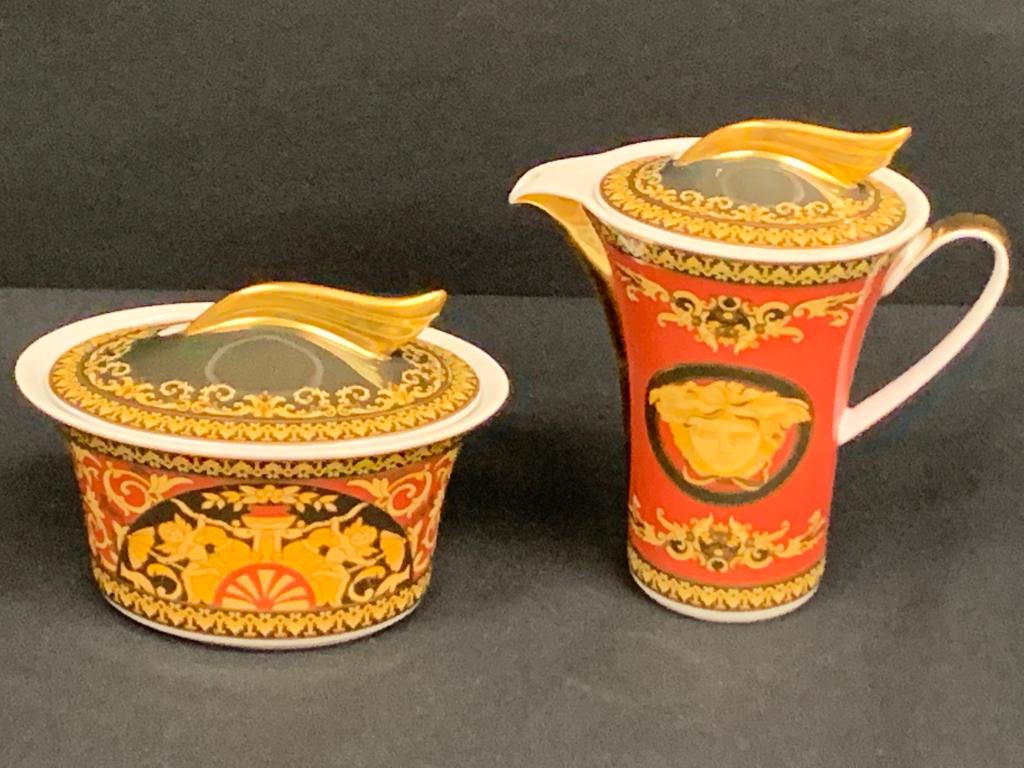 VERSACE BY ROSENTHAL MEDUSA CREAM SUGAR SVC SET: Barocco design by Rosenthal for Versace with Medusa headed center. Excellent condition. Sugar is 3.5" tall and Creamer is 4.5" tall in size. Third party shipping required.