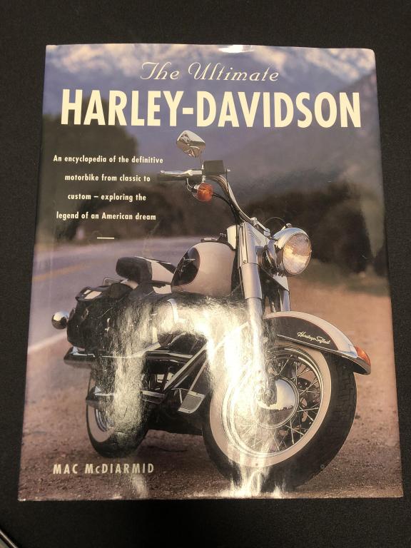HARLEY-DAVIDSON COFFEE TABLE BOOKS AND TOYS: This is a pair of Harley-Davidson Coffee Table Books. The Ultimate Harley Davidson Encyclopedia and The Art Of The Harley-Davidson. The Encyclopedia is in excellent condition. The Art Of The Harley-Da