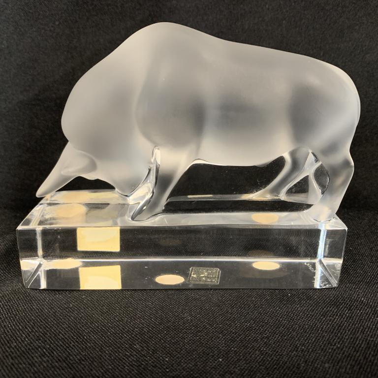 LALIQUE CRYSTAL BULL ON BASE FIFURINE PAPERWEIGHT: Lalique Crystal Bull on Base Figurine Paperweight Hand Signed on Bottom: Lalique France 4 1/4" Long x 1 1/2" Wide x 3 3/4" TallExcellent ConditionNo chips, nicks or cracksA few light marks on bottomHa