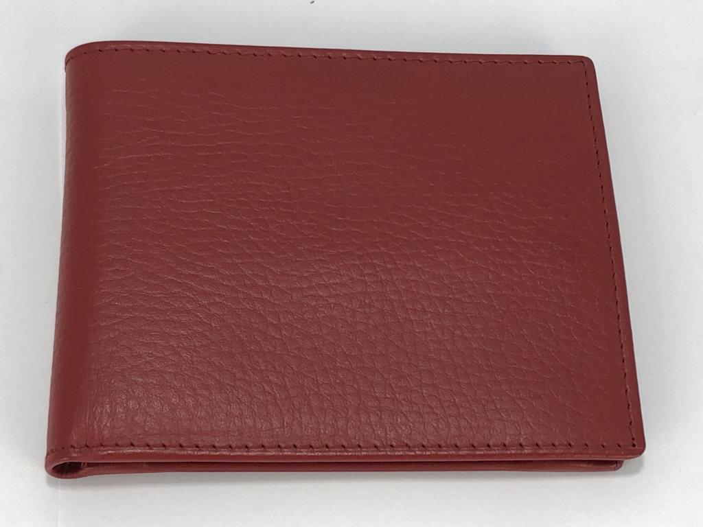 ROLEX RED LEATHER UNISEX FOLDING POCKET WALLET: Red Rolex unisex leather wallet. Credit card section, bill section and change purse .9" x 3 3/4"Like new condition!