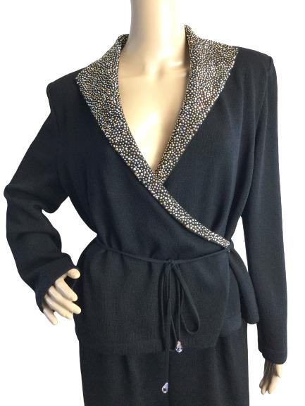 ST JOHN EVENING BLACK CRYSTAL LAPEL SWEATER SZ 8: STUNNING cross over with gold and silver lapel crystals. Wraps and ties completely around. Excellent condition.Size 8 on tag. 16" shoulders42" bust26" length24" sleeves