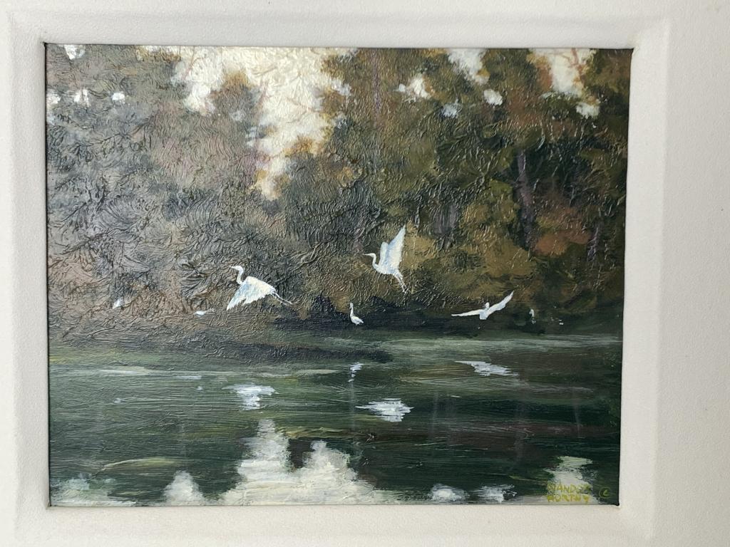 NANDOR HORTHY ORIGINAL ART EGRETS FLYING FRAMED: Nandor Horthy (Hungarian-Canadian, c.1927-) is a modern day Impressionist artist. This oil painting is the artist's depiction of a picturesque lake with egrets flying along the marsh.Measurements: fra