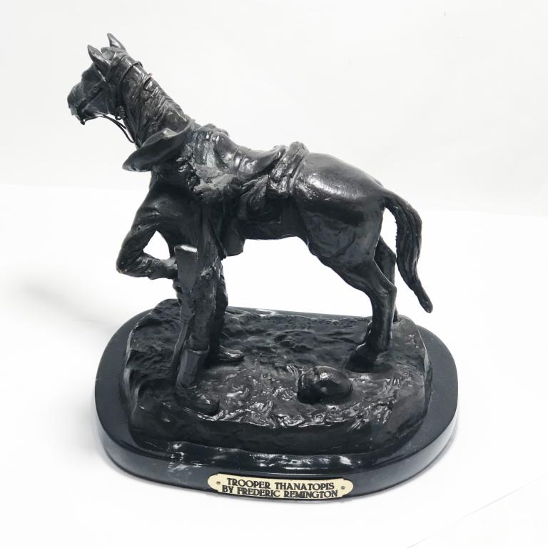 TROOPER THANATOPIS REMINGTON 9.5" BRONZE STATUE: Tropper Thanatopis by Frederic Remington Bronze StatueBeautiful condition. Stands on black marble base. Dimensions: 9'' W x 6'' D x 9.5'' H