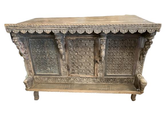 ANTIQUE BALINESE HANDCARVED ELABORATE CONSOLE: World traveler's collectors piece. Elaborately handcarved console piece. Great condition, weathered appearance. 48" wide, 24" deep and 28" tall in size.