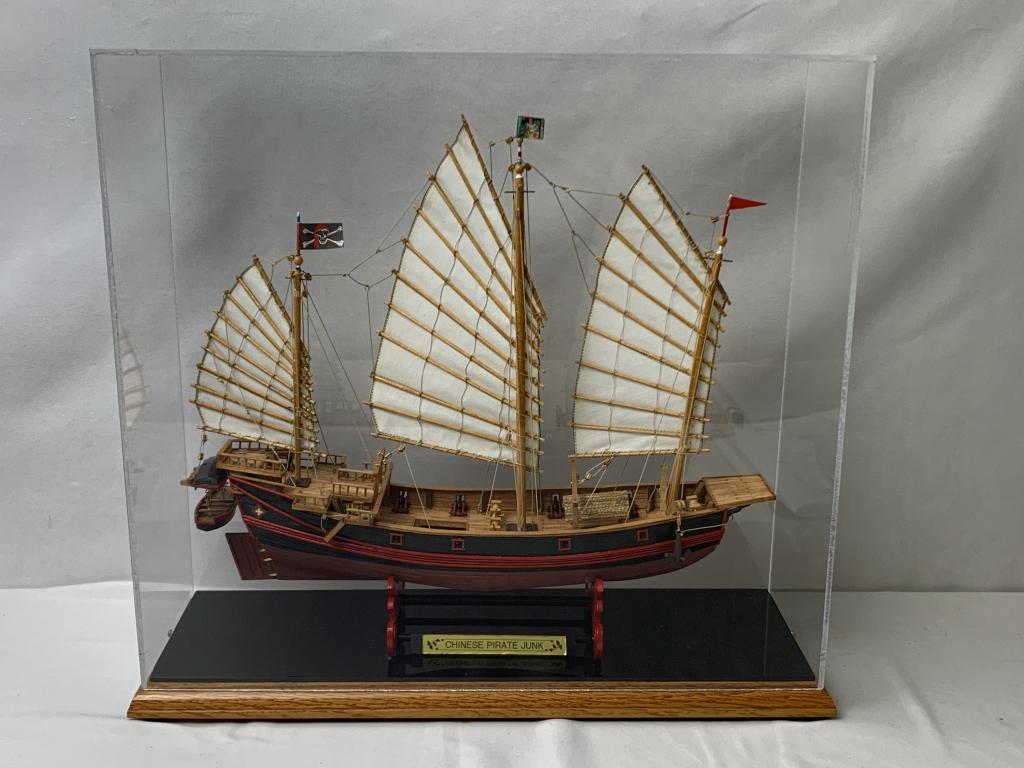 CHINESE PIRATE JUNK WOOD 1/100TH SHIP MODEL W/CASE: The Chinese Pirate Junk is part of Amati's Historic Wooden Ship Model Kit Series. Lucite case included.Scale : 1:100Length: 15-1/2" (400mm)Height: 13" (335mm)