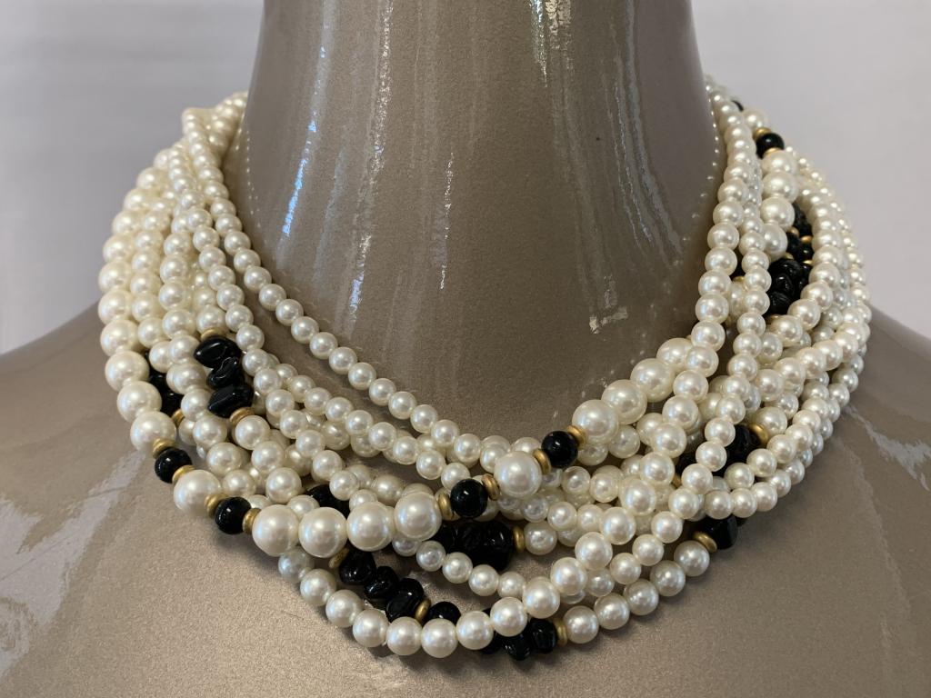 STUNNING TWISTED PEARL STRANDS W/ BLACK CHOKER: Stunning costume jewelry vintage pearl strands all rolled together. Measures 16" in length. Excellent condition.