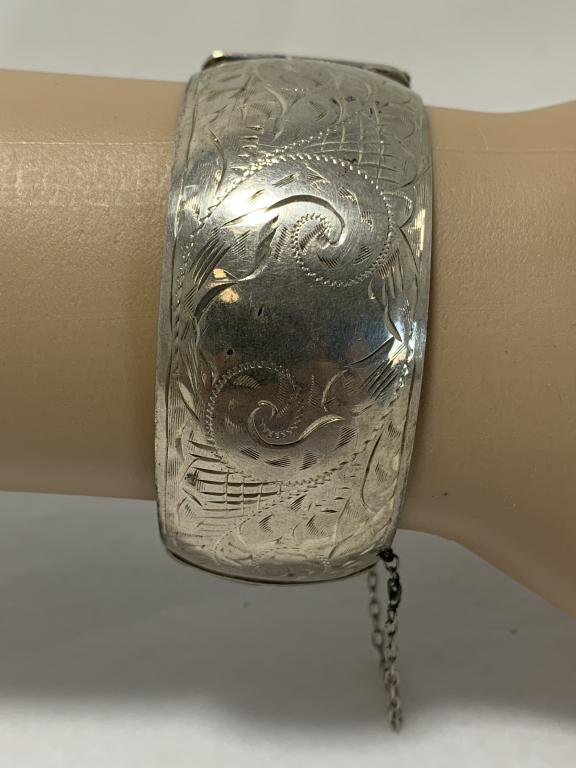 VINTAGE ETCHED STERLING SILVER WIDE CUFF BRACELET: Beautiful and impressive wide cuff bracelet, stamped sterling. Chain attached and slide closure for closing. Excellent condition.