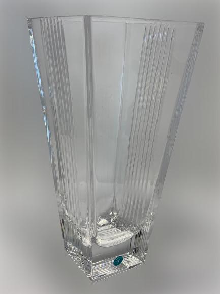 TIFFANY & CO MADE IN ITALY SQUARED 10.5" TALL VASE: Tiffany & Co vase in a tall 10.5" squared top design. Crystal elegance, excellent condition. Maker mark still attached. 10.5" tall x 5" width at the top and 3" with at the base.