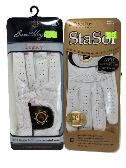 PAIR NEW BEN HOGAN FOOTJOY STASOF GOLF GLOVES M L: A pair of golf gloves both in size medium left. One by Ben hogan and one FootJoy StaSoft - new condition in package.