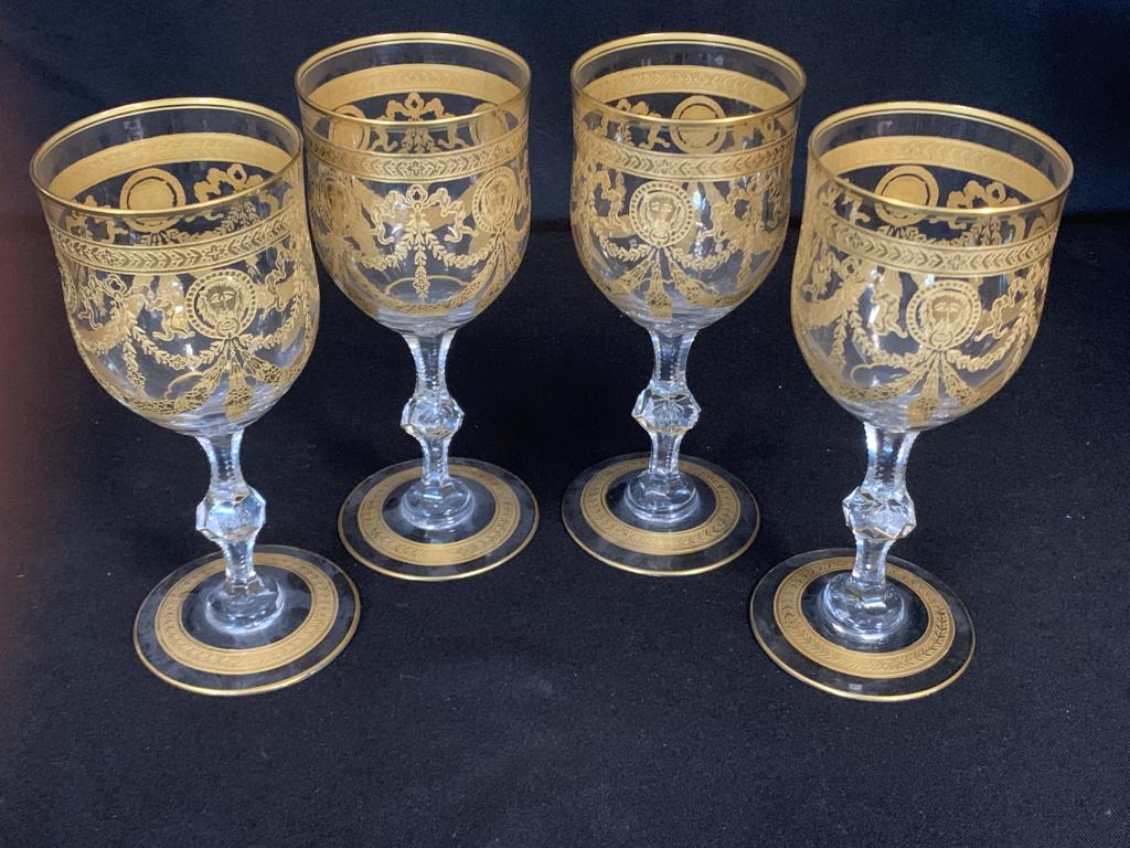 SAINT LOUIS "CONGRESS" CRYSTAL WINE GLASSES X 4: Circa 1910, St. Louis, France. This set of magnificent Saint Louis crystal in the rare gilt Congress pattern is complete for four wine glasses. This pattern has long been discontinued and is difficult